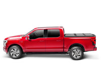 Load image into Gallery viewer, Extang 21-24 Ford F-150 (5ft. 7in. Bed) Solid Fold ALX