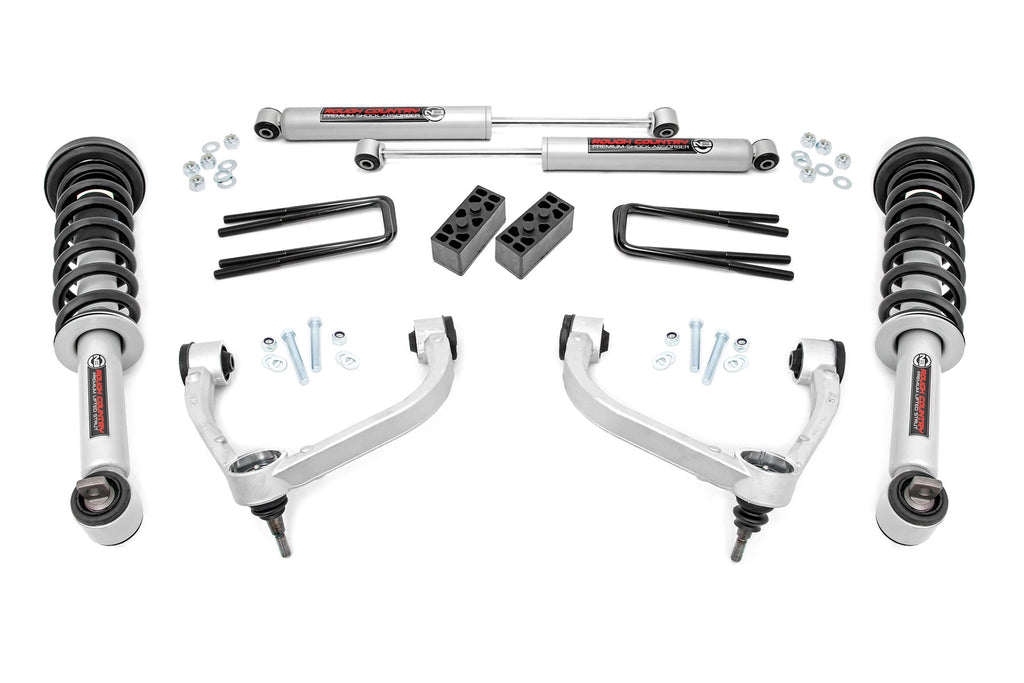 Components of the 3-inch lift kit for Ford F-150 4WD, including N3 struts, coil springs, and hardware