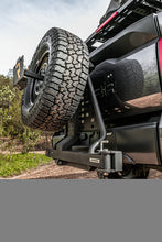 Load image into Gallery viewer, Go Rhino Swing-A-Way Tire Carrier Hitch Mounted Textured Black