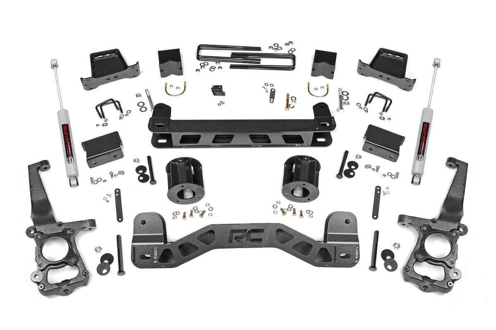 Components of a 6-inch lift kit for Ford F-150 2WD, including sway bars and suspension parts