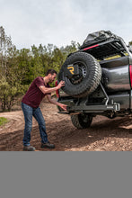 Load image into Gallery viewer, Go Rhino Swing-A-Way Tire Carrier Hitch Mounted Textured Black