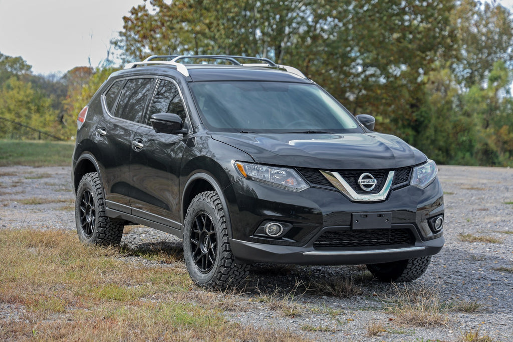 Close-up view of the 1.5 Inch Lift Kit installed on a Nissan Rogue 4WD (2014+)