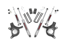 Load image into Gallery viewer, Components of the 3-inch lift kit for Chevy Silverado and GMC Sierra 1500 2WD, including front and rear lift parts