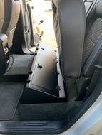 Built-in storage compartment under the back seat of a Chevrolet Colorado
