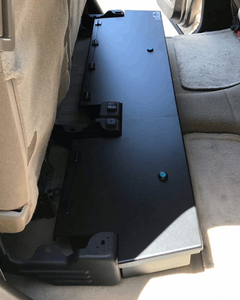 Close-up view of the under-seat lockable storage system for a Toyota Tundra Double Cab