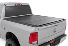 Load image into Gallery viewer, Hard Tri-Fold Flip Up Bed Cover - 6'4 In. Bed - Ram 1500 (10-18) 2500 (10-23)