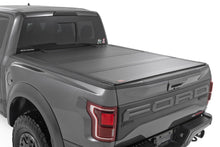 Load image into Gallery viewer, Hard Tri-Fold Flip Up Bed Cover - 5'7 In. Bed - Ford F-150 (21-23) F-150 Lightning (2022)