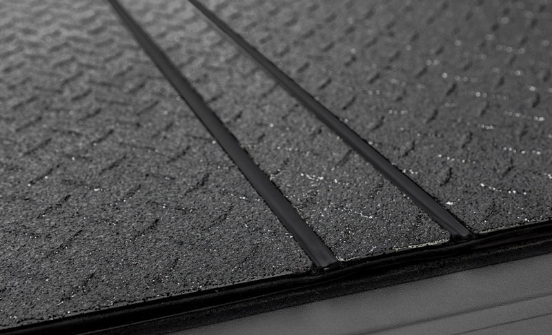 Access 2022+ Rivian R1T 4ft 6in Bed (w/ OEM Tonneau Track) LOMAX Folding Hard Cover - Black Diamond