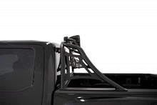 Load image into Gallery viewer, Detailed view of the Pro Chase Rack on the back of a Ford Raptor