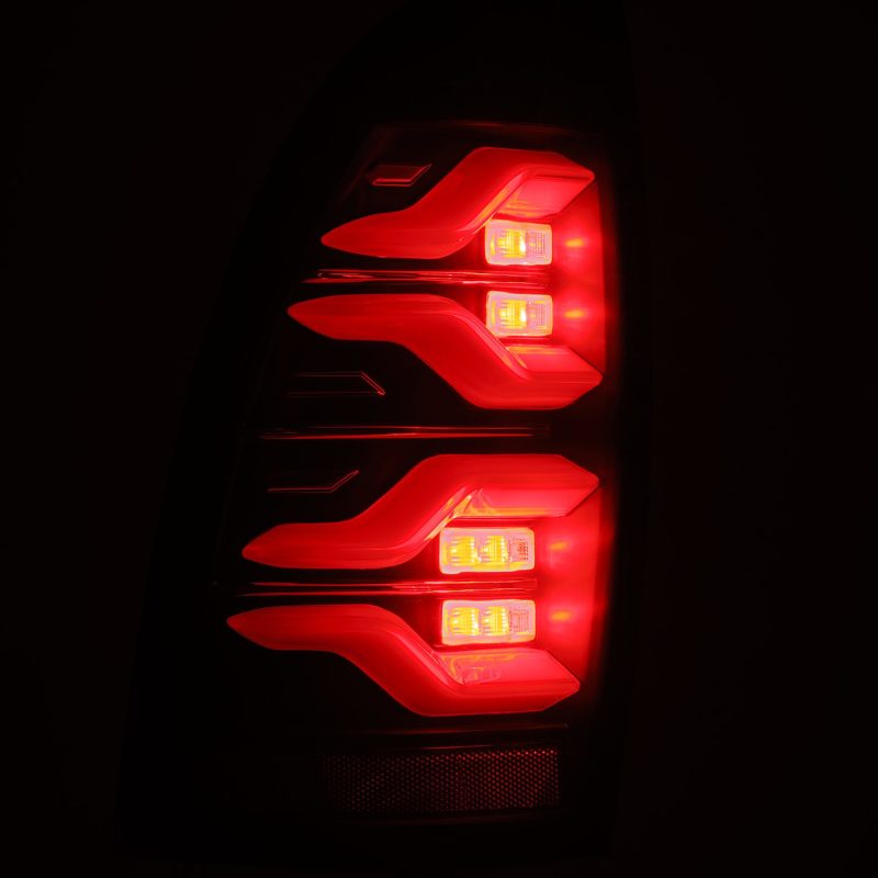 AlphaRex 2005-2015 Toyota Tacoma LUXX LED Taillights Blk w/Active Light/Seq Signal