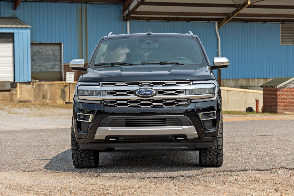 Black 2018 or newer Ford Expedition equipped with a 2-inch lift kit featuring aluminum spacers