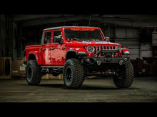 Load image into Gallery viewer, Jeep Gladiator JT with 6-inch lift kit installed showcasing increased ground clearance