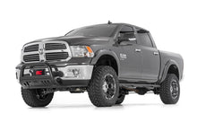 Load image into Gallery viewer, Ram 1500 4WD truck enhanced with a 6-inch Rough Country lift kit and black aftermarket bumper