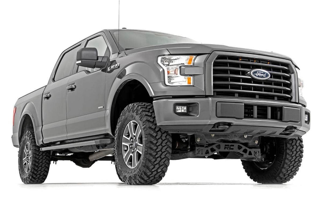 Ford F-150 equipped with a 4-inch Rough Country lift kit showcasing the elevated stance