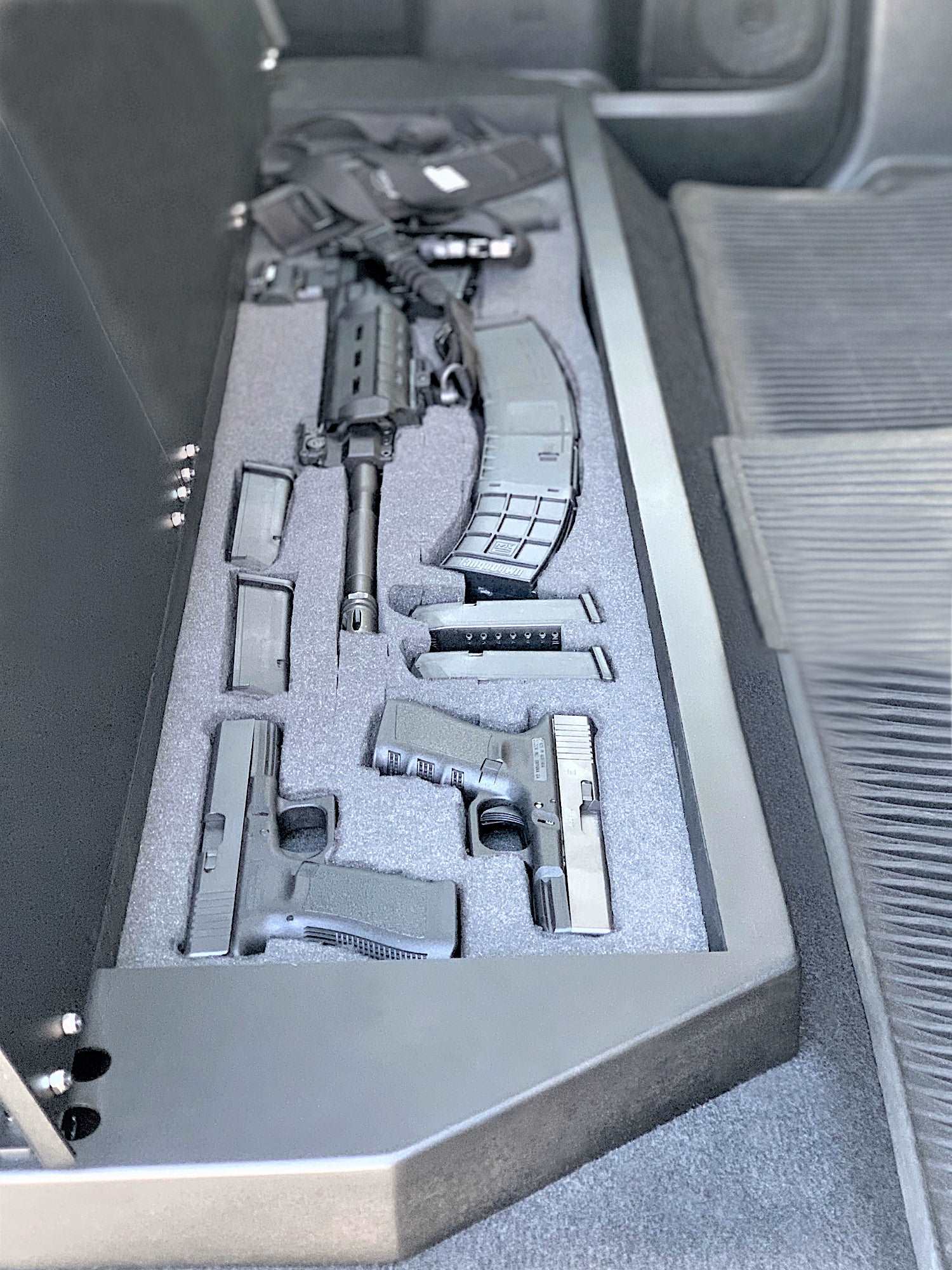 Lockable storage box designed for 2014-2021 Toyota Tundra CrewMax installed under the rear seat