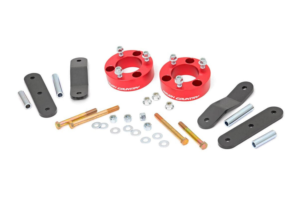 Components of a 2.5 Inch Lift Kit for Nissan Frontier and Xterra models