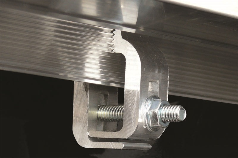 Detailed image of the bracket and screw for the Access Tonnosport cover installation
