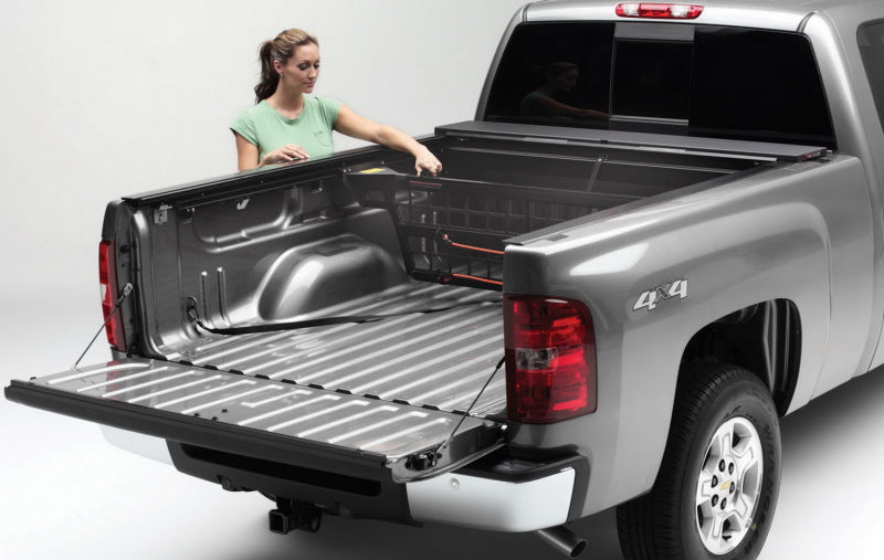 Roll-N-Lock 07-14 Chevy Silverado/Sierra w/ OE Rail Caps LB 96-1/4in Cargo Manager