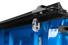 Load image into Gallery viewer, Rear view of Dodge Dakota showcasing the lock on the Lund Genesis Roll Up Tonneau Cover