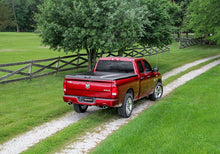 Load image into Gallery viewer, UnderCover Toyota Tacoma 5ft Elite Bed Cover - Black Textured (Req Factory Deck Rails)