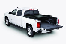 Load image into Gallery viewer, Side view of a white Chevy pickup with the Tonno Pro tonneau cover on the truck bed