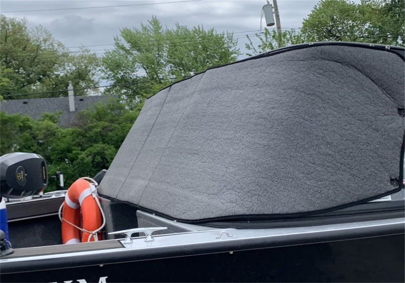 Detailed view of a boat with the Truxedo Boat Windshield Protector in black