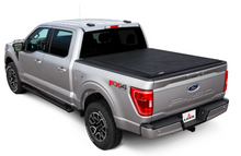 Load image into Gallery viewer, LEER 2013+ Nissan Frontier SR250 50NF13 CC 5Ft Tonneau Cover - Rolling Compact Short Bed