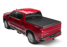 Load image into Gallery viewer, Lund Nissan Frontier Styleside (5ft. Bed) Hard Fold Tonneau Cover - Black