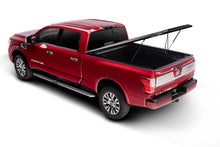 Load image into Gallery viewer, UnderCover Nissan Titan 5.5ft SE Bed Cover - Black Textured
