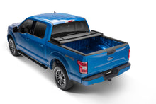 Load image into Gallery viewer, Lund Nissan Titan (5.5ft. Bed w/o Titan Box) Genesis Elite Tri-Fold Tonneau Cover - Black