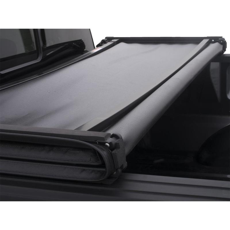 Lund RAM 1500 (5.5ft Bed w/o RamBox Cargo Mgmt) Genesis Tri-Fold Tonneau Cover - Black