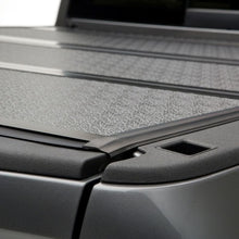 Load image into Gallery viewer, Undercover Nissan Frontier 6ft. Flex Tonneau Cover