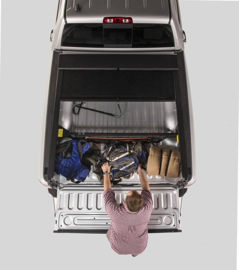Roll-N-Lock 07-14 Chevy Silverado/Sierra w/ OE Rail Caps LB 96-1/4in Cargo Manager