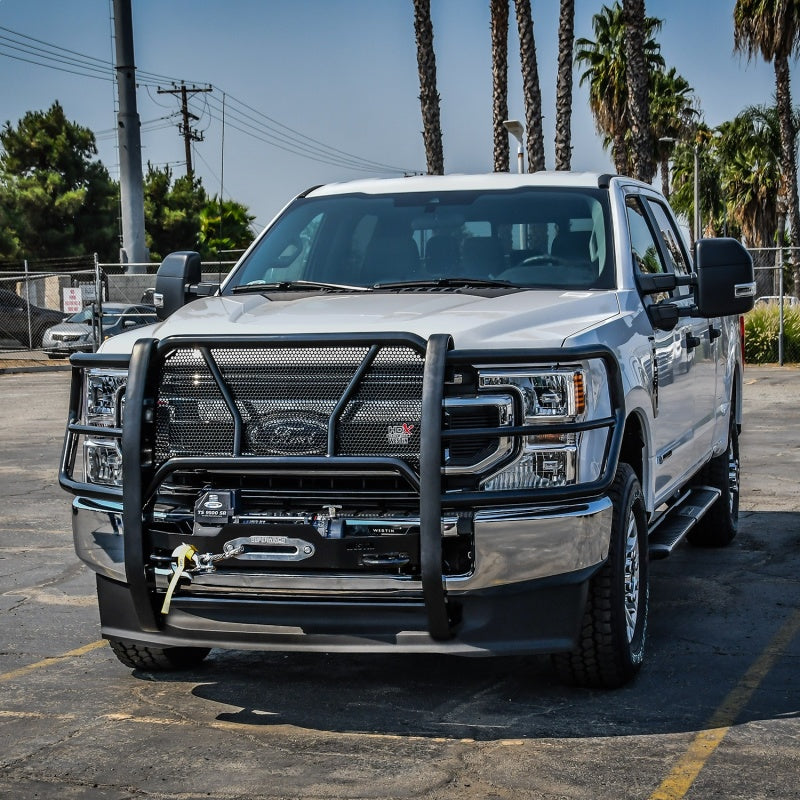 White Ford F-350 equipped with the Westin HDX Winch Mount Grille Guard