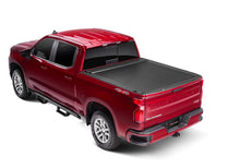 Load image into Gallery viewer, Roll-N-Lock 15-19 Chevy Silverado/Sierra 2500/3500 77-3/8in E-Series Retractable Tonneau Cover