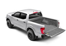Load image into Gallery viewer, Nissan Frontier with an open bed showcasing the BedRug liner