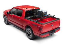 Load image into Gallery viewer, Roll-N-Lock Nissan Frontier CC (58.6in bed) M-Series XT Tonneau Cover