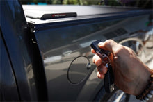 Load image into Gallery viewer, Roll-N-Lock Chevy Silverado 1500 77-3/4in E-Series Retractable Tonneau Cover