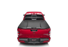 Load image into Gallery viewer, UnderCover Nissan Frontier 5ft Elite Bed Cover - Black Textured