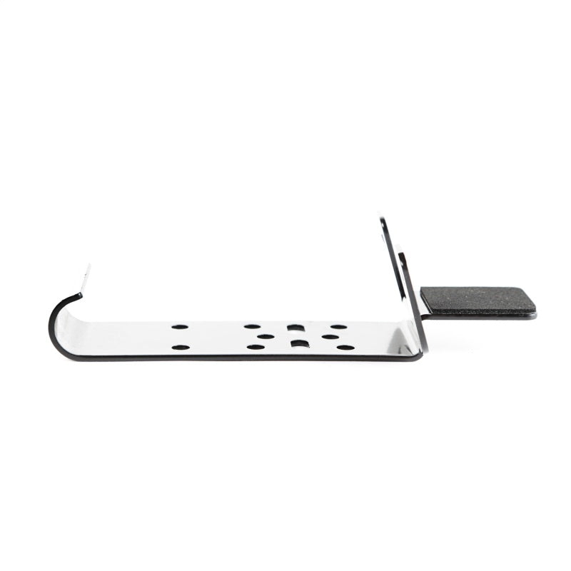 CB radio mount by Rugged Ridge for Jeep Wrangler TJ, displayed on a shelf