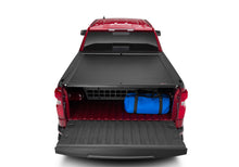 Load image into Gallery viewer, Roll-N-Lock Chevy Silverado/Sierra w/ OE Rail Caps SB 77-3/4in Cargo Manager