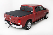 Load image into Gallery viewer, Lund Dodge Ram 1500 (5.5ft. Bed) Genesis Elite Tri-Fold Tonneau Cover - Black