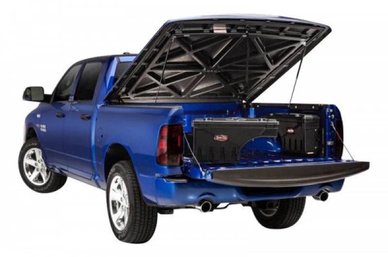 UnderCover Nissan Frontier Ext/Crew All Beds Drivers Side Swing Case - Black Smooth