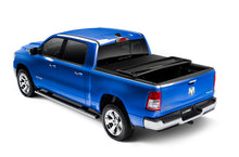 Load image into Gallery viewer, Lund Dodge Ram 1500 (5.5ft. Bed) Genesis Elite Tri-Fold Tonneau Cover - Black