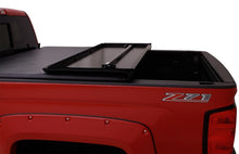 Load image into Gallery viewer, Lund Nissan Titan (5.5ft. Bed) Hard Fold Tonneau Cover w/Bracket Kit - Black
