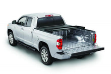 Load image into Gallery viewer, Tonno Pro 04+ Nissan Titan 6.7ft (Incl 42-498 Utility Track Kit) Tonno Fold Tri-Fold Tonneau Cover