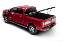 Load image into Gallery viewer, UnderCover Nissan Titan 5.5ft SE Bed Cover - Black Textured