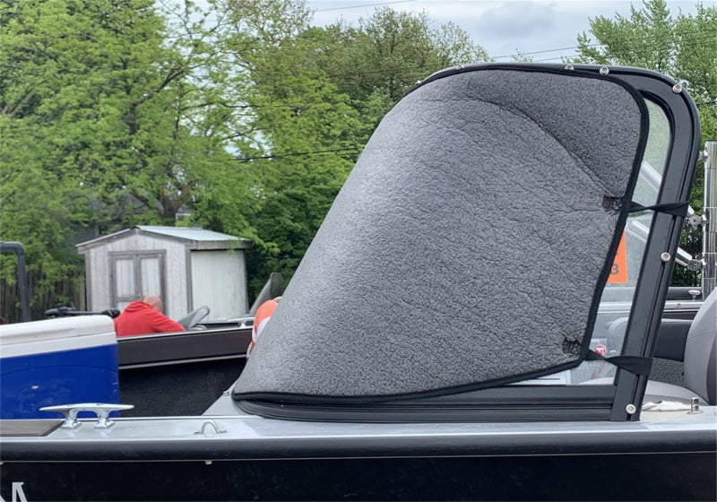 Frontal view of a boat featuring the Truxedo Boat Windshield Protector in gray