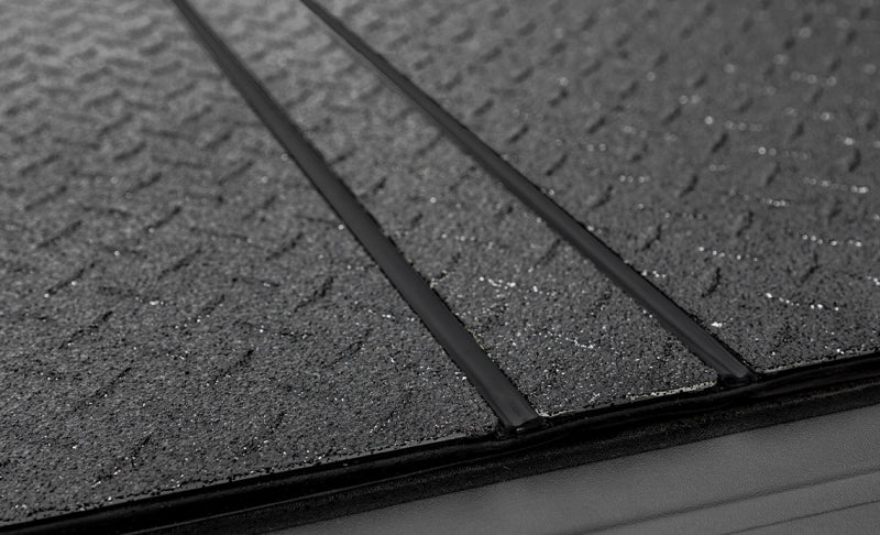 Access LOMAX Pro Series Tri-Fold Cover 07+ Toyota Tundra 6ft6in Bed (Deck Rail) - Blk Diamond Mist