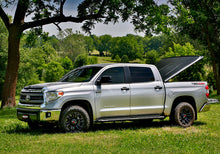 Load image into Gallery viewer, UnderCover Toyota Tacoma 5ft SE Bed Cover - Black Textured (Req Factory Deck Rails)